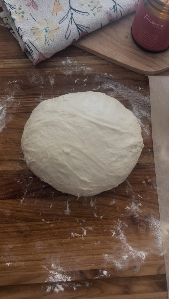 Shaped Easy Yeast Artisan Bread on a wooden cutting board